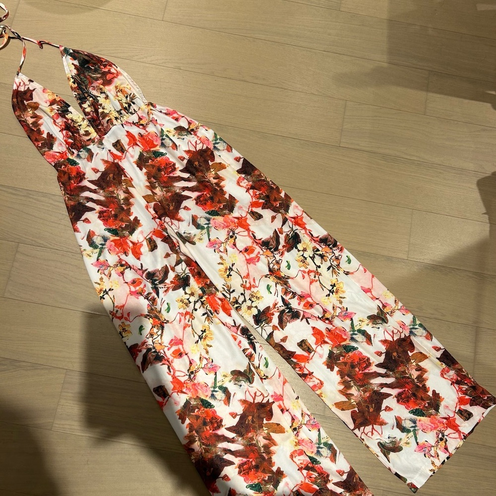 Pretty little thing women’s jumpsuit with cut out back. USsize 8. Only worn once